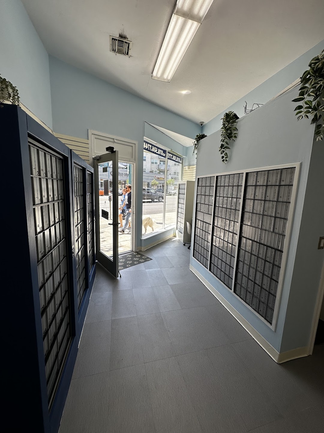 Inside NOHO Mailbox — private mailbox banks and the front door on Lankershim Blvd